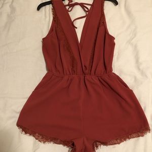 Dark peachy romper!